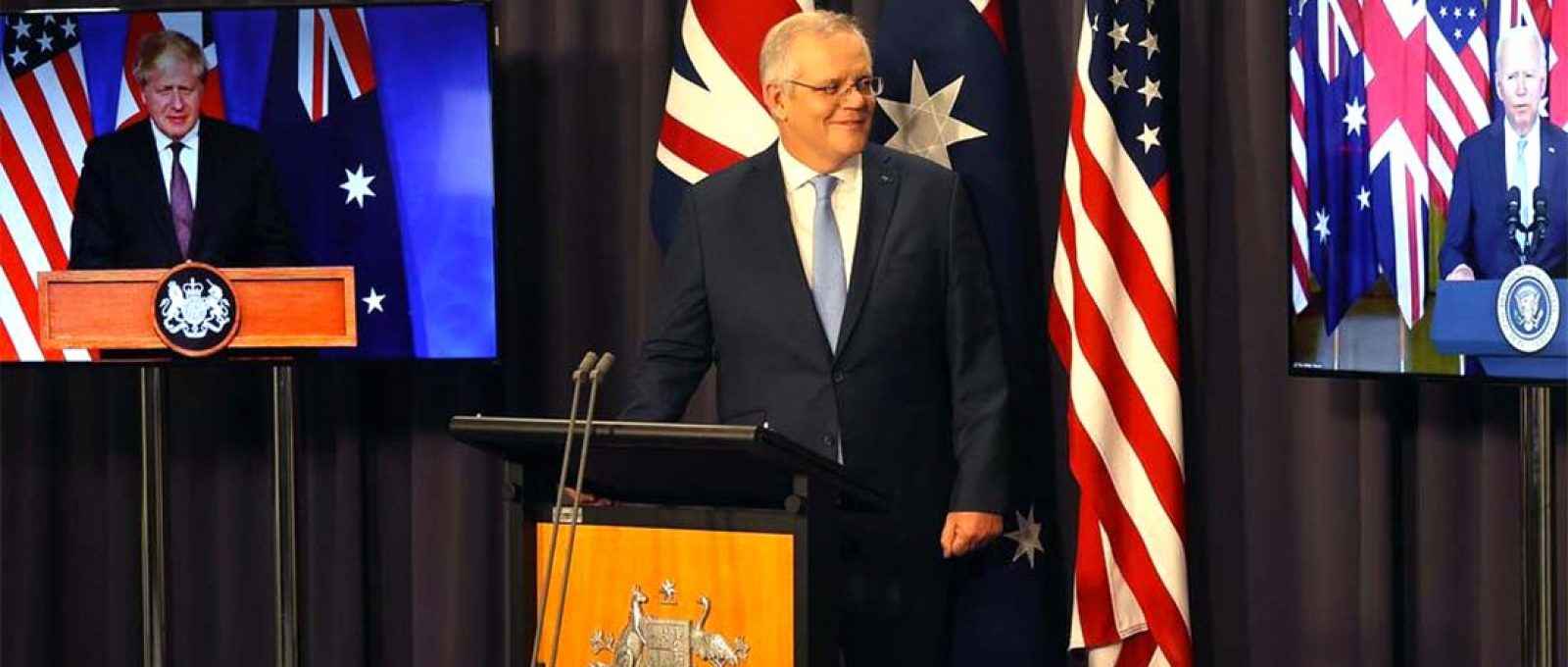 O primeiro-ministro australiano, Scott Morrison, em teleconferência com o presidente americano, Joe Biden, e o primeiro-ministro britânico, Boris Johnson, durante o anúncio do AUKUS (Foto: The Australian).