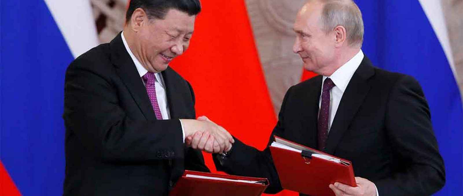 Os presidentes Xi Jinping, da China, e Vladimir Putin, da Rússia (Foto: Evgenia Novozhenina/Reuters).